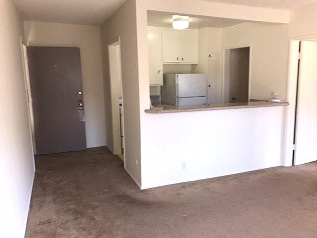 Living Room/ Kitchen