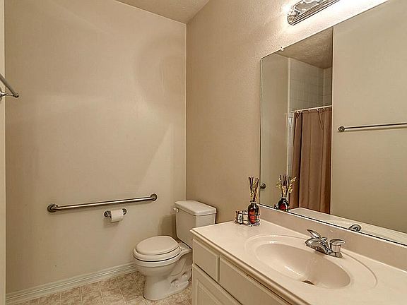 BATHROOM WAS EQUIPPED FOR HANDICAPPED USE
