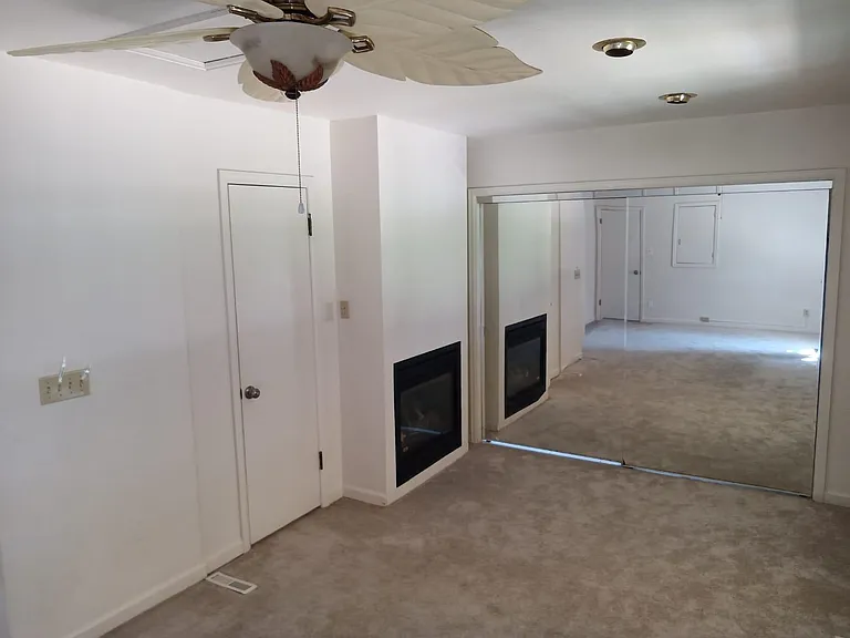 Master bedroom showing gas fireplace