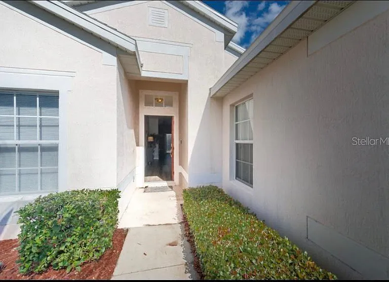 8121 Fan Palm Way — Photo 3