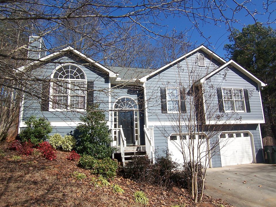 Set back with long driveway