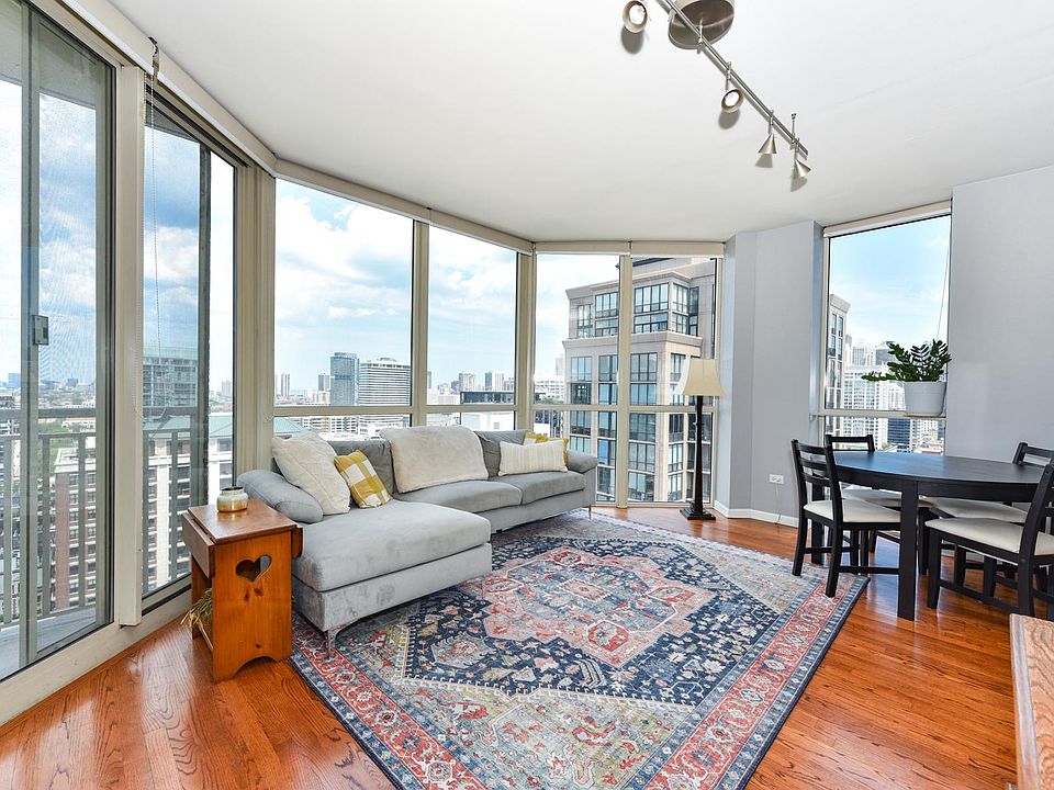 Floor to ceiling windows with shades