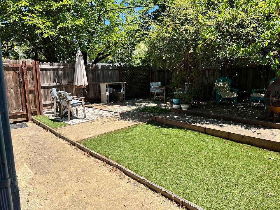 Private backyard tiered patio area.