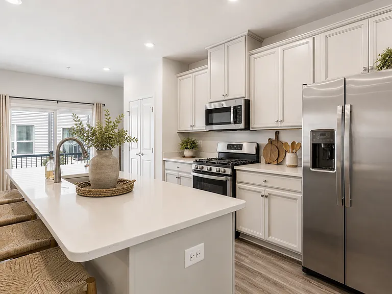 Quartz counters, stainless appliances, gas stove, designer cabinetry. Kitchen Perfection. (Photos are virtually staged)