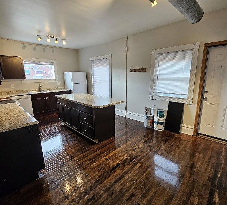 Spacious Kitchen that leads to the back deck and entrance.