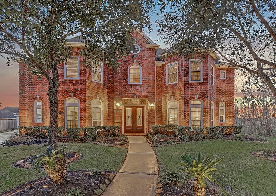 Enjoy luxurious living both inside and out. This fabulous five bedroom home with a three-car garage offers both formals, a two-story study, a media room, game room, and a spectacular backyard paradise with a heated inground pool and spa. This home en