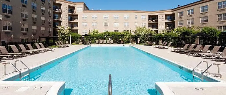 Lounge At Our Outdoor Swimming Pools with Sundeck