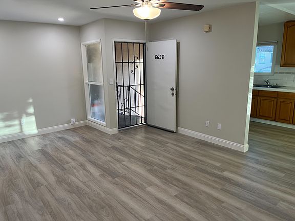 Living room with new ceiling fan.