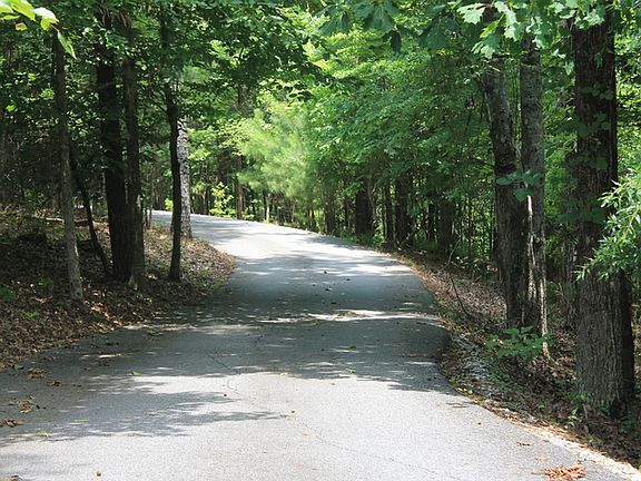 4 acres private gated drive