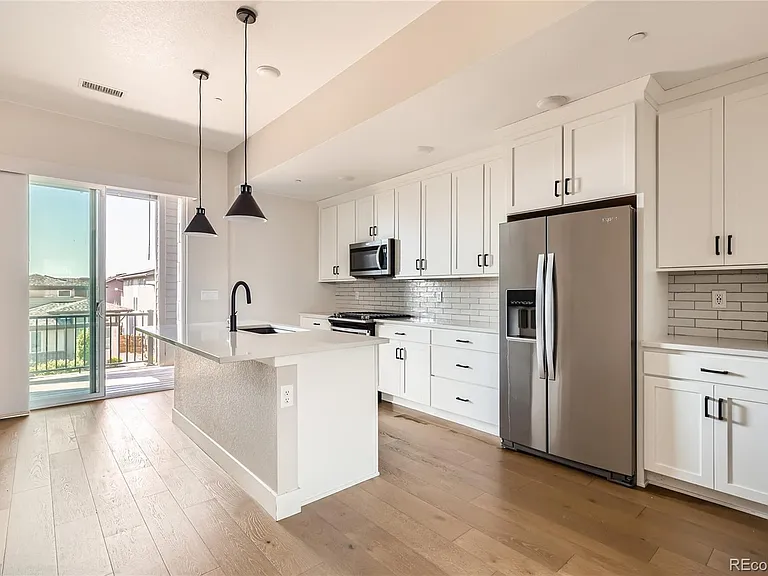 1565 W 67th Ave — Photo 4