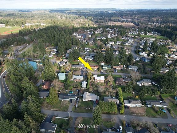 Looking eastward at the house, towards Illahee and Seattle in the distance.  