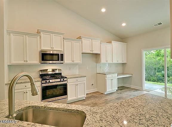 2nd image of 6939 English Holly Court SW Lot 40