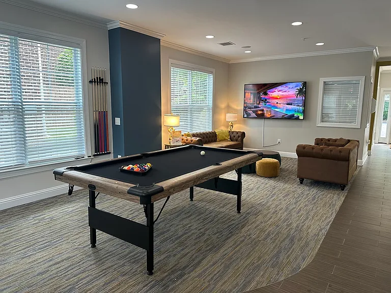 Elevate your downtime in our resident clubhouse featuring a stylish billiards lounge designed for relaxation, connection, and friendly competition. __