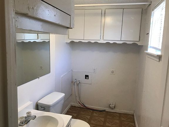 Half bath with washer & drier hook-ups