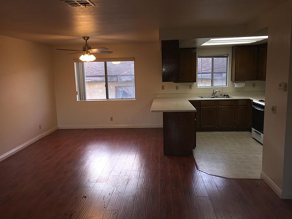 Dining Area with Fan. Kitchen to Right