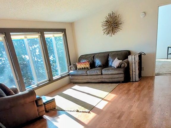 Living room and entry to master. Picture taken from hallway between 2 bedrooms