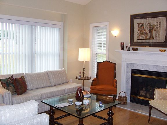 Hardwood floors and vaulted ceiling in the living room