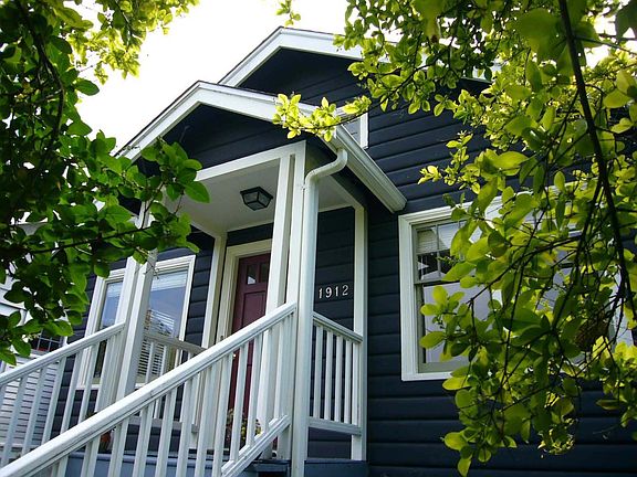Beautiful 1920 bungalow sits high above 4th Ave W, drenched with natural light