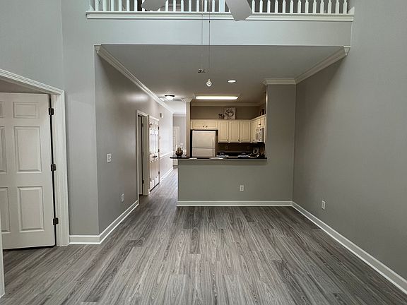 Freshly painted with new LVP flooring throughout! The living room has two skylights, new ceiling fan, and a view from the loft!