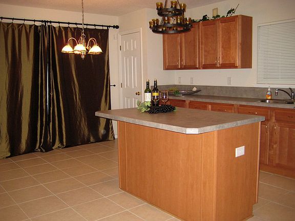 Electrical outlet on Island/Breakfast nook/Pantry & sliding doors to patio