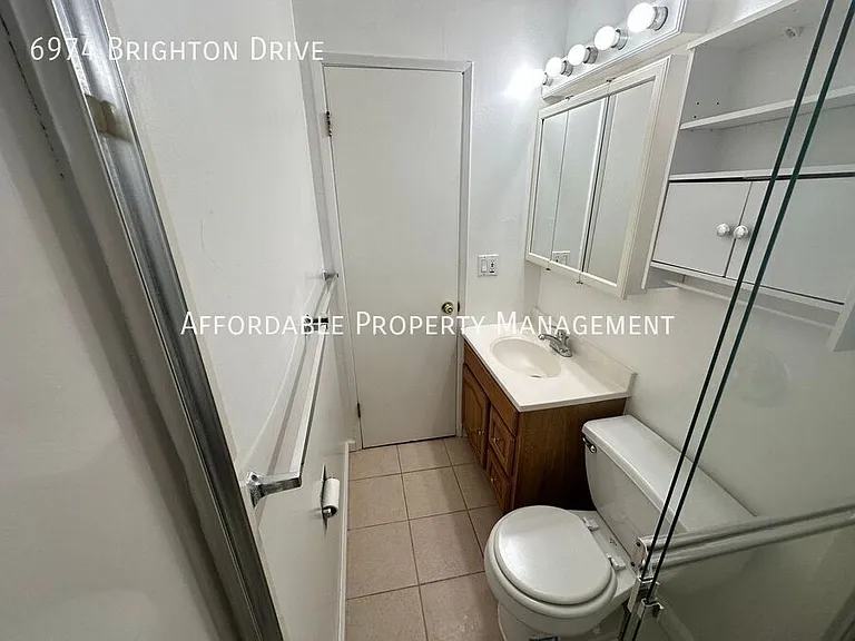6974 Brighton Dr — Photo 10