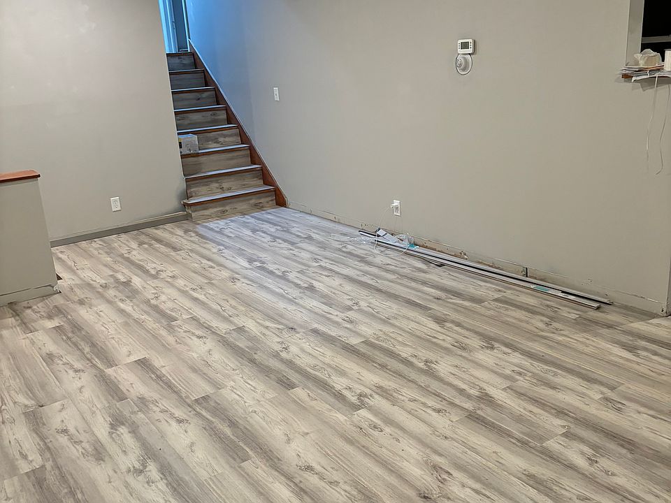 New flooring in living room .