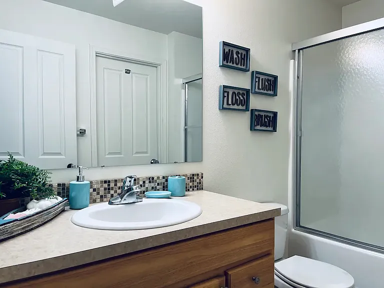 Primary bath with full size walk in closet en-suite