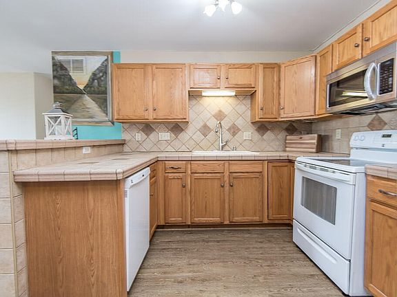 4th image of 6952 S Rolling Meadows Ct #201