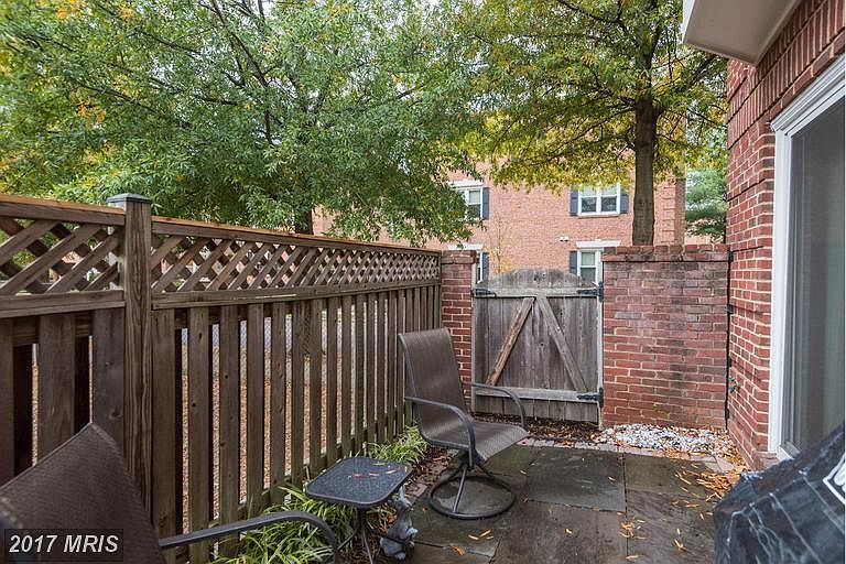 Fenced Patio next to Playground