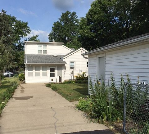 Bk of home w/concrete drive