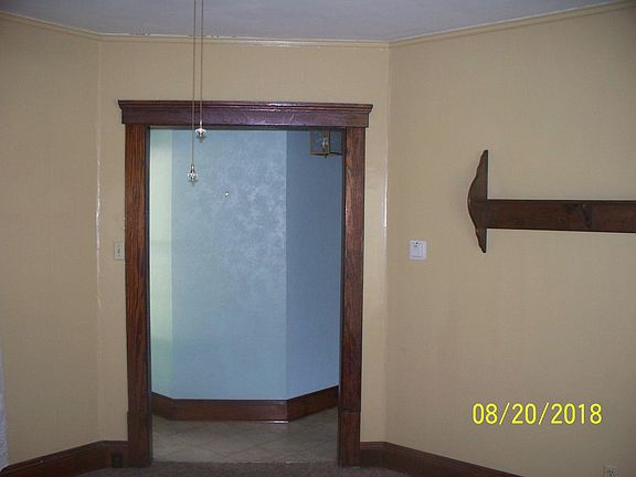 Living room, looking toward entrance