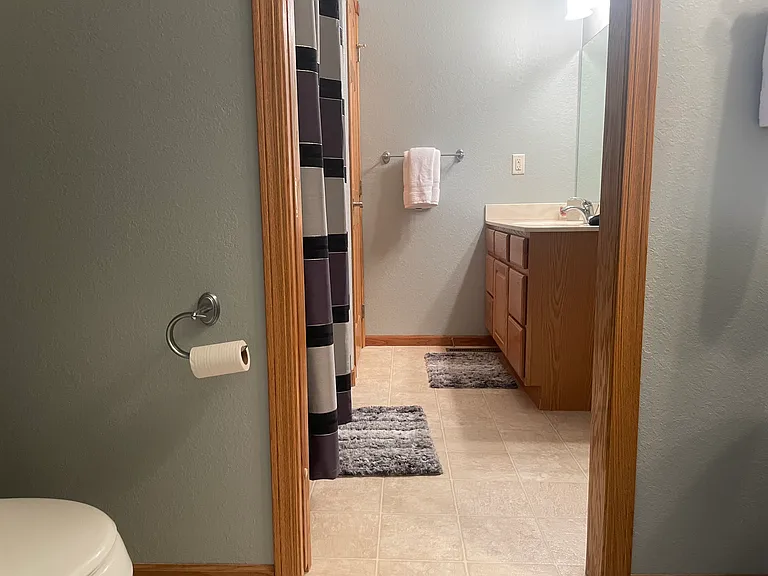 Second bathroom which has access from hallway or secondary bedroom on upper level.