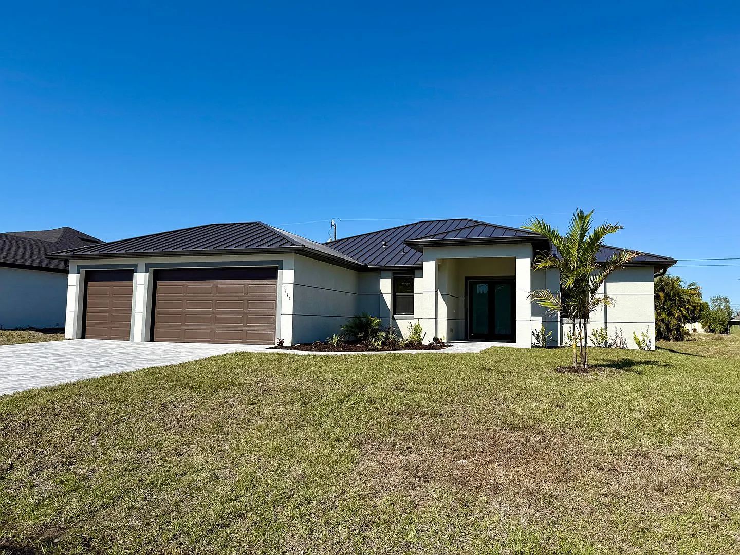 Brand-New Waterfront Luxury in Cape Coral | Heated Pool, Spa, Outdoor Kitchen & 3-Car Garage — Photo 2