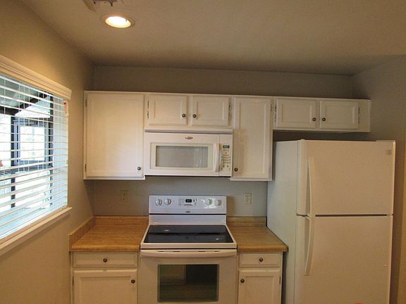 Clean kitchen includes all appliances.
