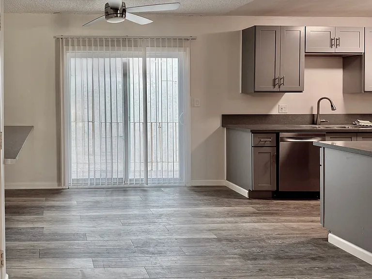 Dining Room with Quartz Bar, Sliding Doors to Balcony.