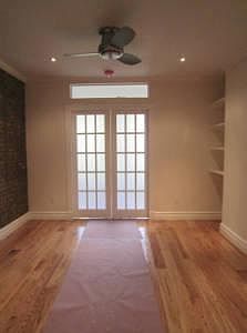 3rd image of 380 E 10th St APT 3A