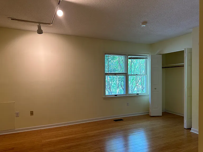 The upstairs front bedroom overlooks the street
