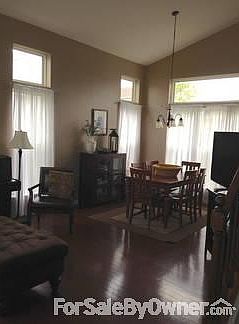 Living/Dining Room with vaulted ceiling