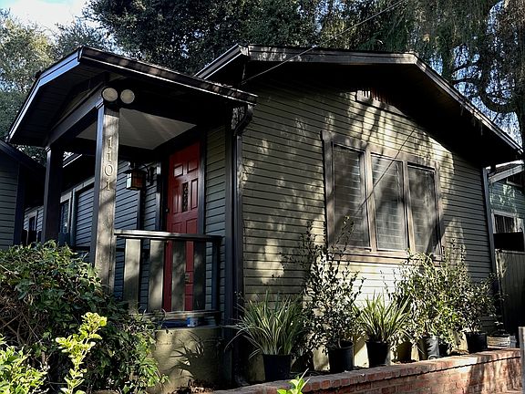 Front of house on Claremont with partial view of front patio