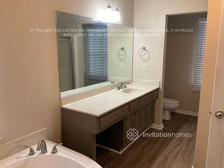 211 Whisperwood Ln NW — Photo 11
