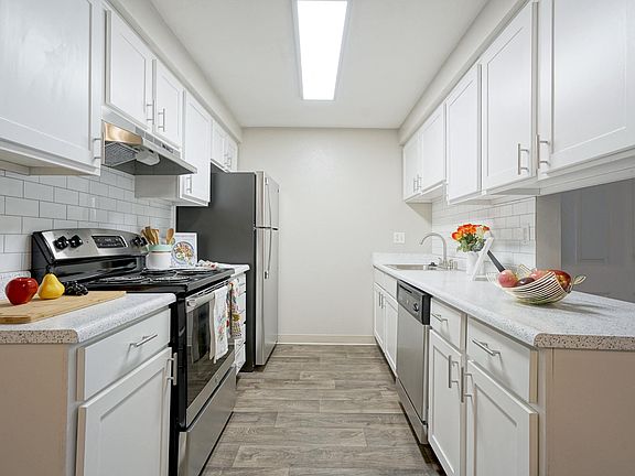 Novela Apartments Full Kitchen view