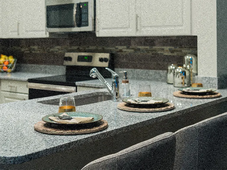 Granite countertops with tile backsplash