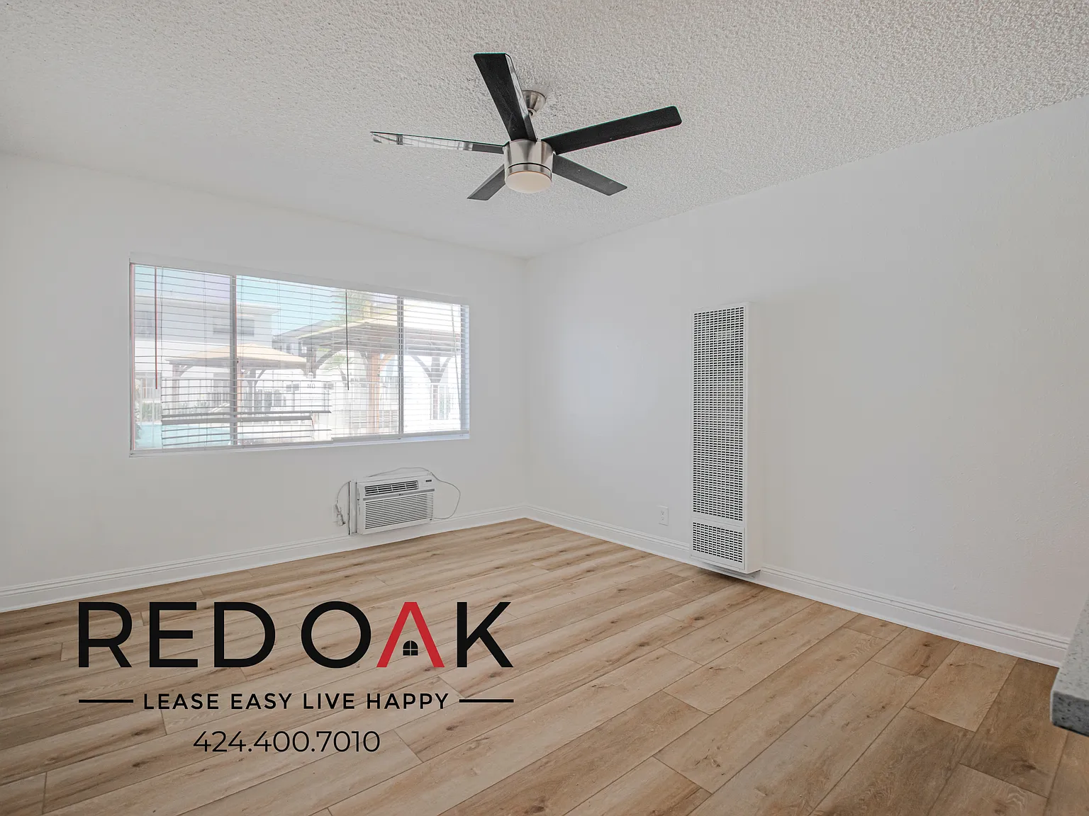 ~1 Month FREE~ Recently Refreshed Two Bedroom with Natural Light, Pool, and Available Parking ~ I... — Photo 2