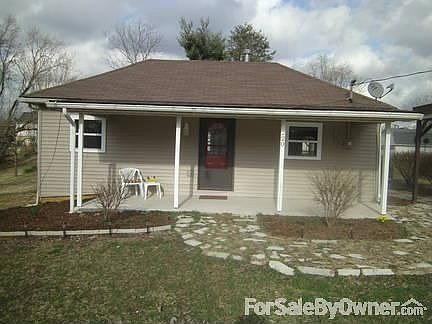 Front View 220 S St. Bedford
						:
						Front view of the house. The carport is to the right of the house.