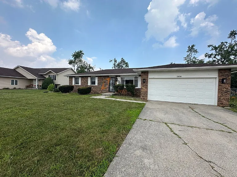 2836 W 63rd Ln — Photo 1