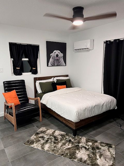 Fully furnished Bedroom with reclining chair