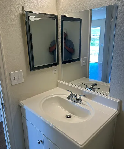 MAIN LEVEL POWDER BATHROOM.
