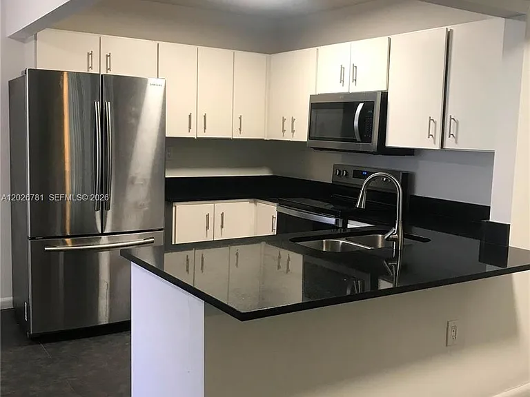 462 NE 210th Circle Ter #1019 — Photo 1