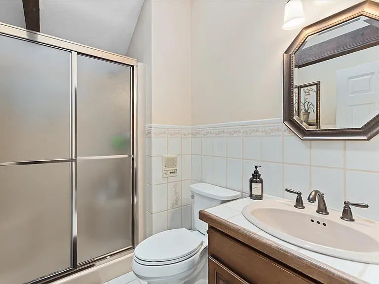 Upstairs bath with shower.