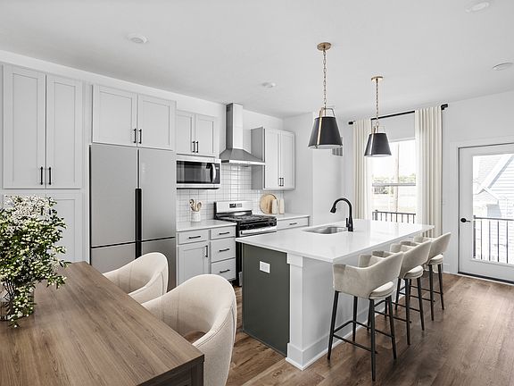 Kitchen w designer finishes and open floor plan